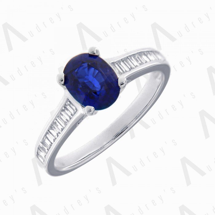 18 KARAT DIAMOND AND GEMSTONE RING