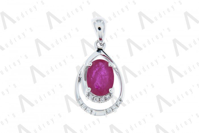 9 KARAT DIAMOND AND GEMSTONE PENDANT