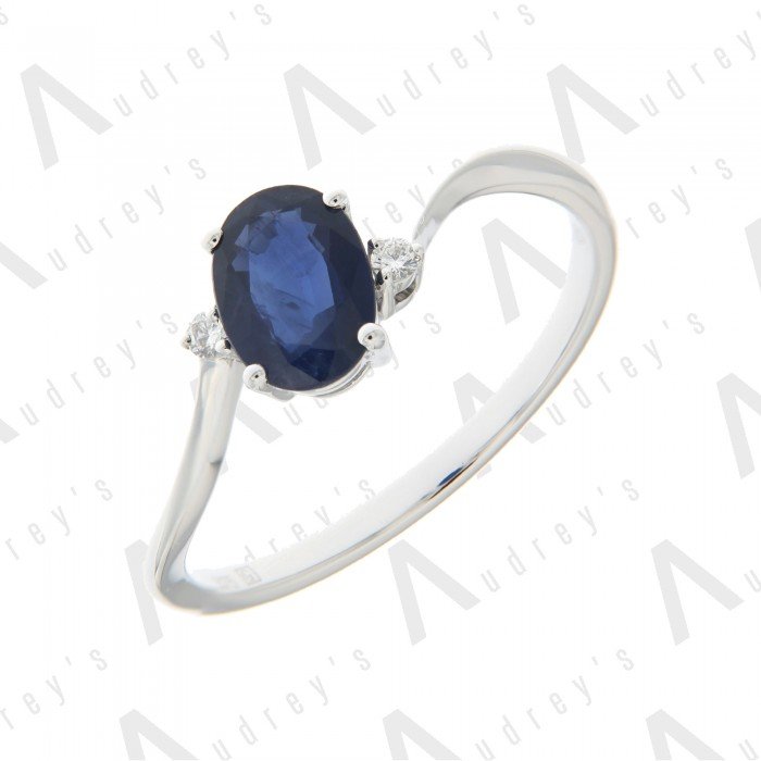 18 KARAT DIAMOND AND GEMSTONE RING