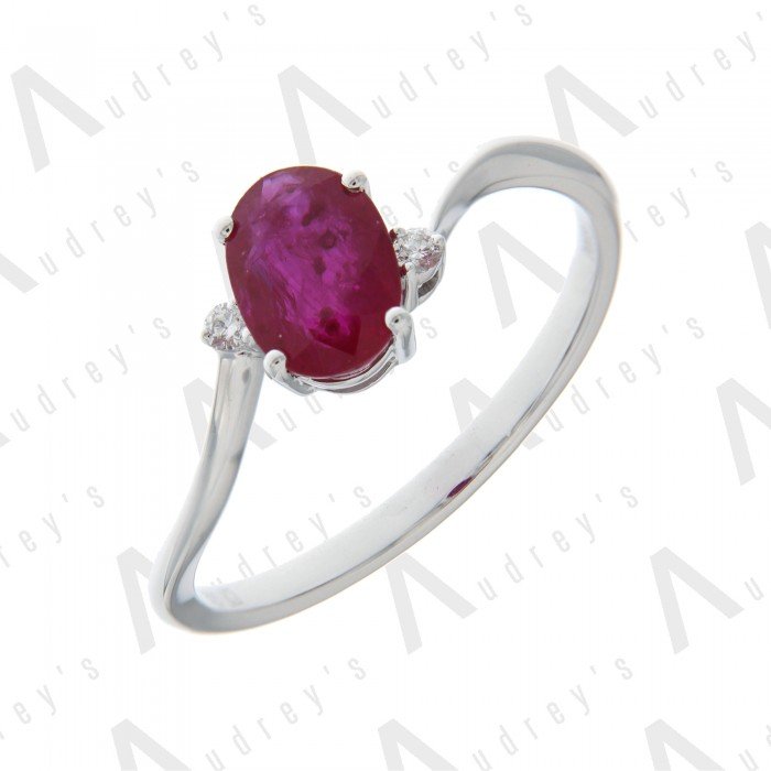 9 KARAT DIAMOND AND GEMSTONE RING