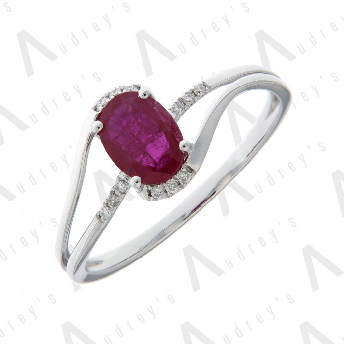 9 KARAT DIAMOND AND GEMSTONE RING