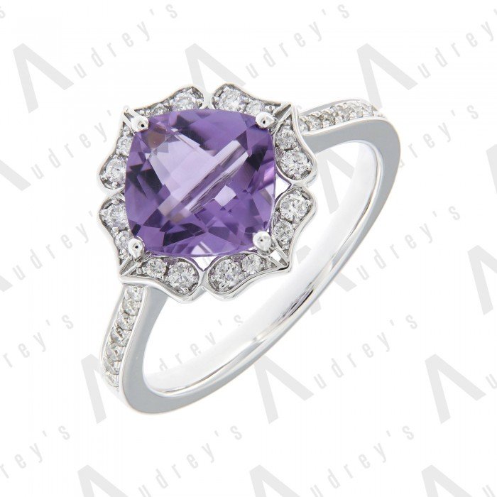 9 KARAT DIAMOND AND GEMSTONE RING