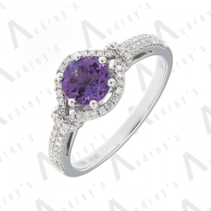 18 KARAT DIAMOND AND GEMSTONE RING