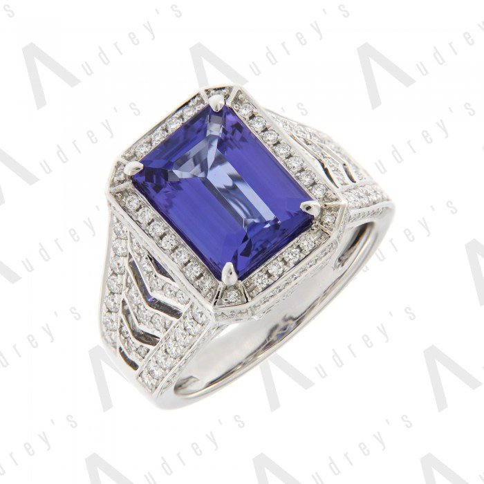 18 KARAT DIAMOND AND GEMSTONE RING