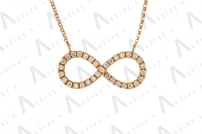 18 KARAT DIAMOND AND NECKLACE
