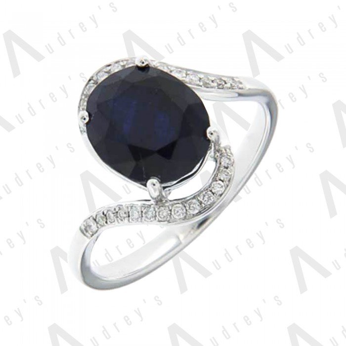 18 KARAT DIAMOND AND GEMSTONE RING