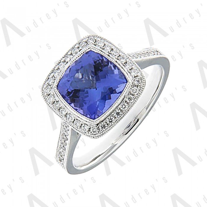 18 KARAT DIAMOND AND GEMSTONE RING