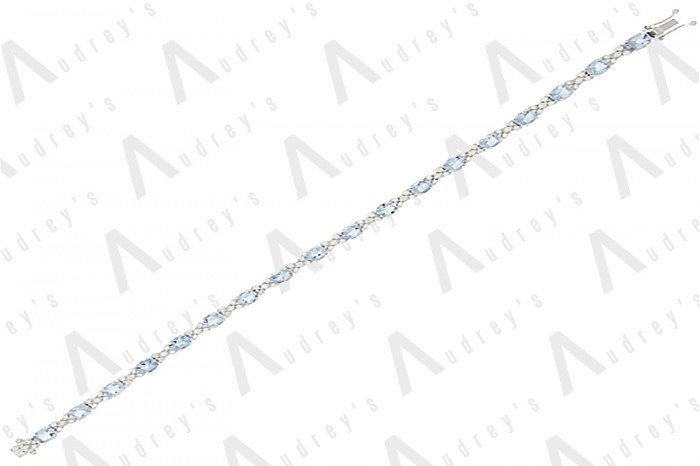 18 KARAT DIAMOND AND GEMSTONE BRACELET