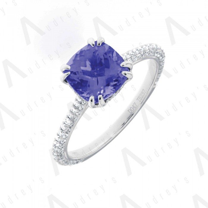 18 KARAT DIAMOND AND GEMSTONE RING