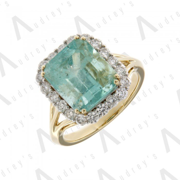 18 KARAT DIAMOND AND GEMSTONE RING