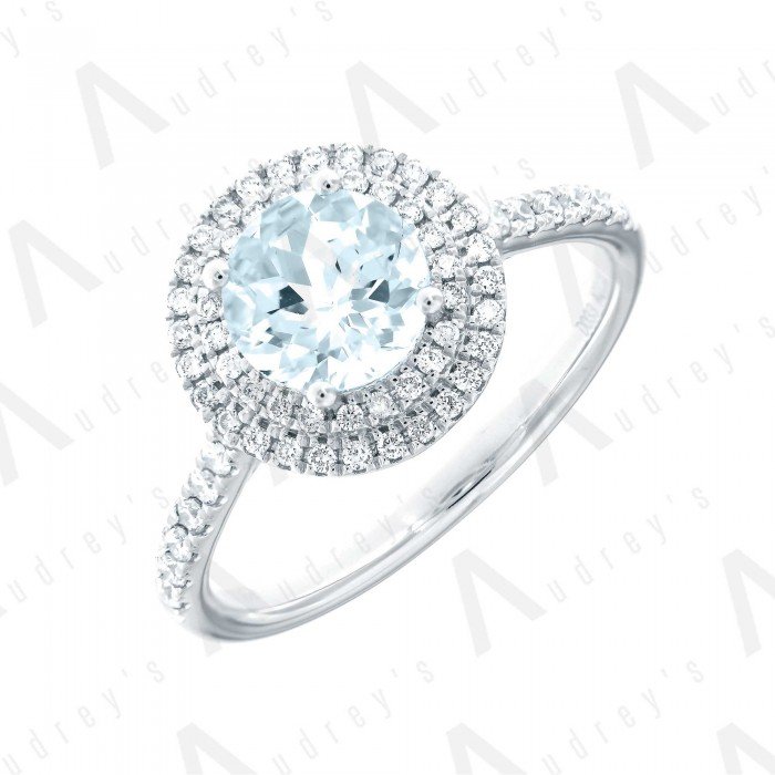 18 KARAT DIAMOND AND GEMSTONE RING