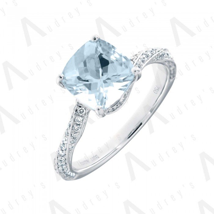 18 KARAT DIAMOND AND GEMSTONE RING