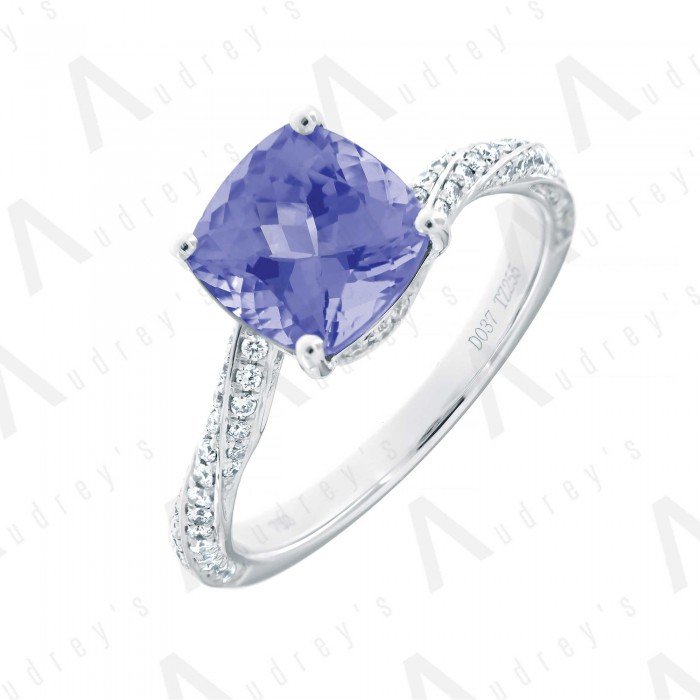 18 KARAT DIAMOND AND GEMSTONE RING
