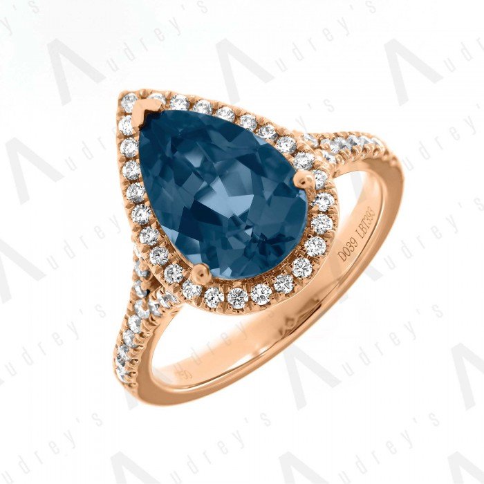 18 KARAT DIAMOND AND GEMSTONE RING