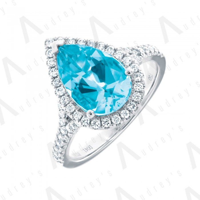 18 KARAT DIAMOND AND GEMSTONE RING