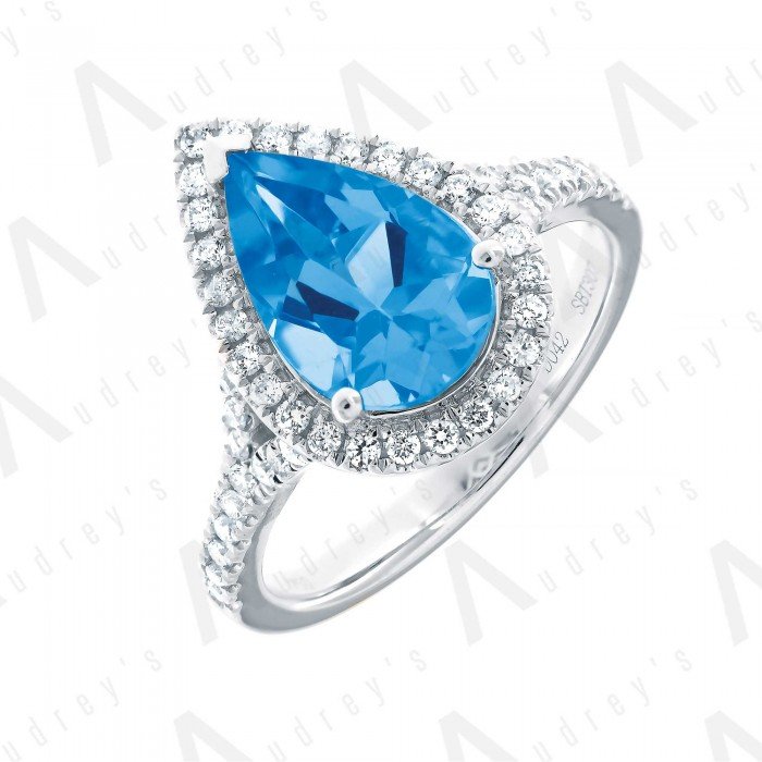18 KARAT DIAMOND AND GEMSTONE RING