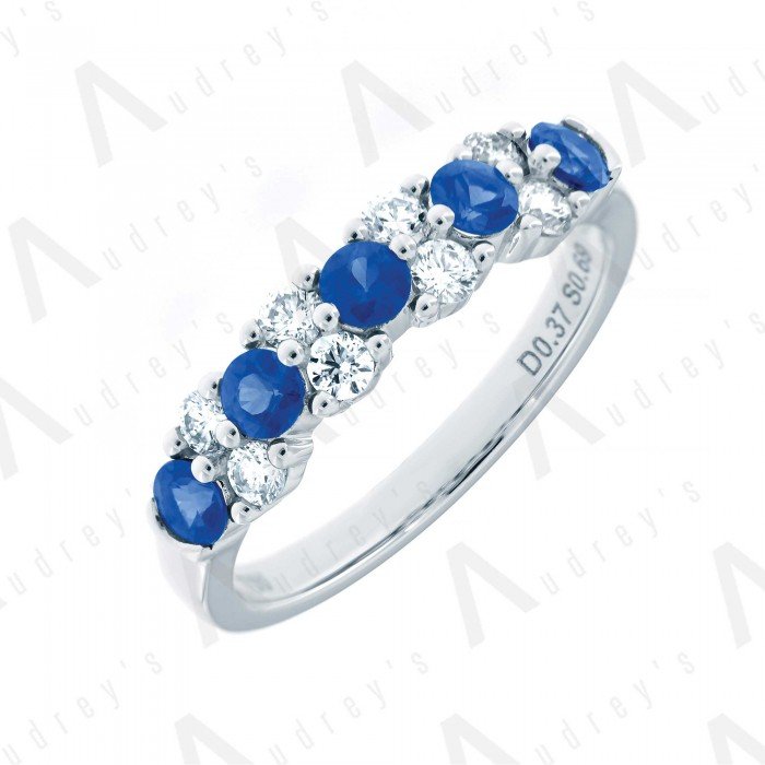 18 KARAT DIAMOND AND GEMSTONE RING