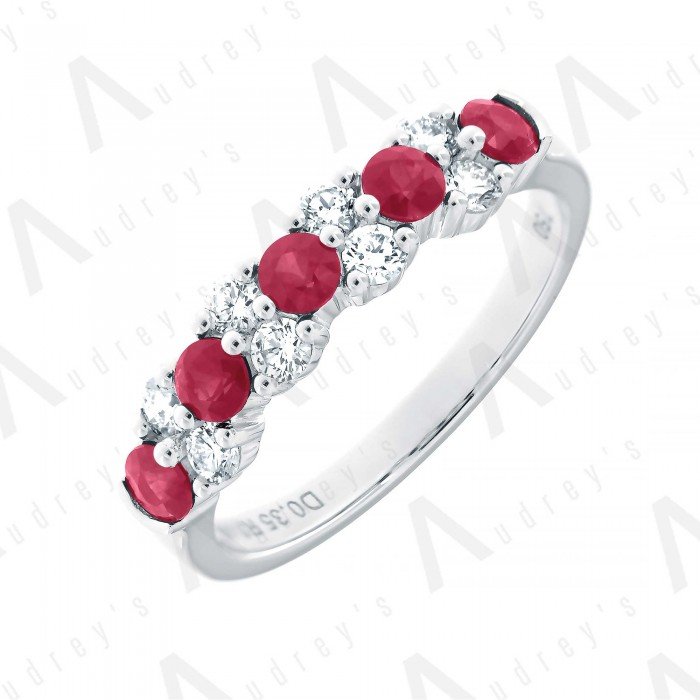 18 KARAT DIAMOND AND GEMSTONE RING