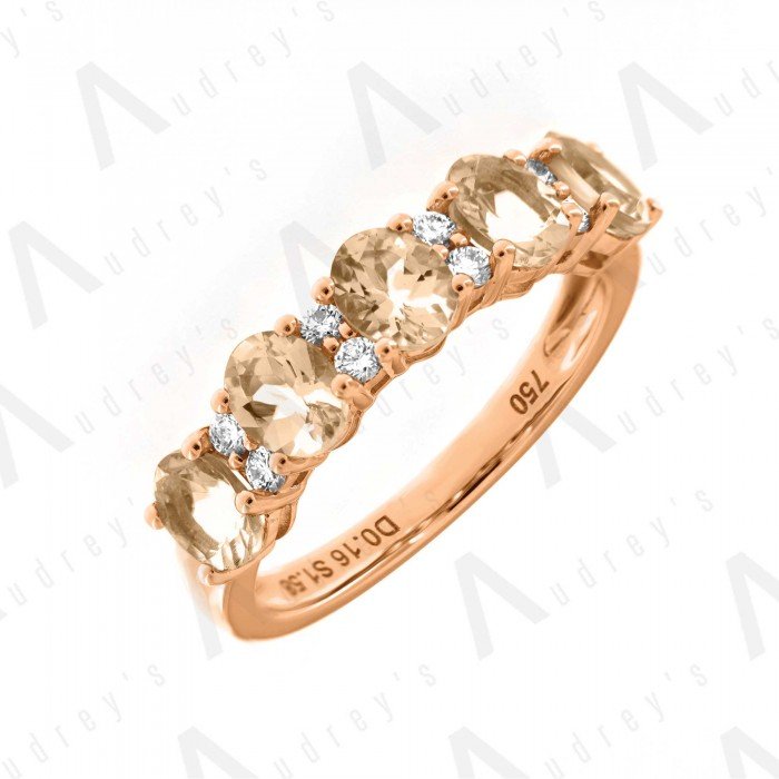 18 KARAT DIAMOND AND GEMSTONE RING
