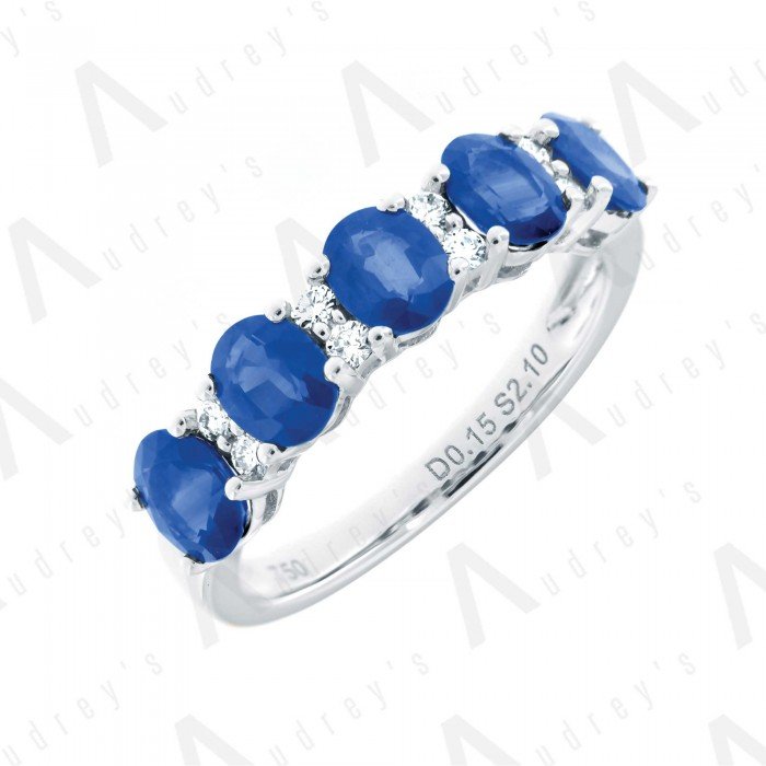 18 KARAT DIAMOND AND GEMSTONE RING