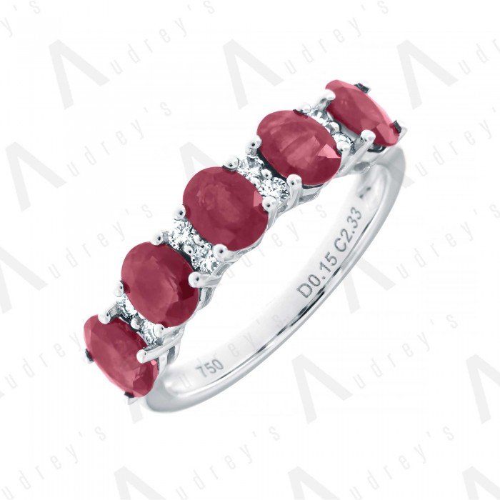 18 KARAT DIAMOND AND GEMSTONE RING