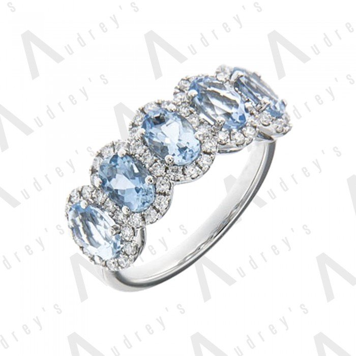 18 KARAT DIAMOND AND GEMSTONE RING