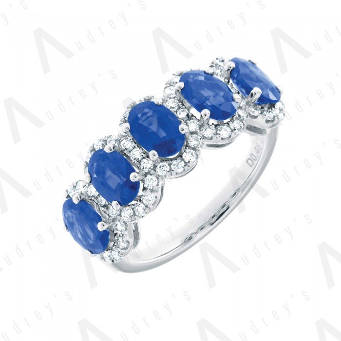 18 KARAT DIAMOND AND GEMSTONE RING
