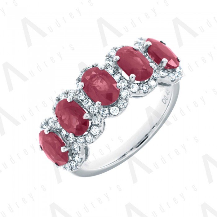 18 KARAT DIAMOND AND GEMSTONE RING