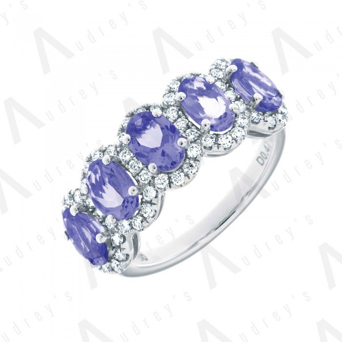 18 KARAT DIAMOND AND GEMSTONE RING