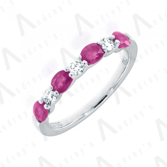 18 KARAT DIAMOND AND GEMSTONE RING