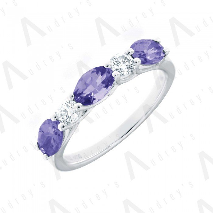18 KARAT DIAMOND AND GEMSTONE RING