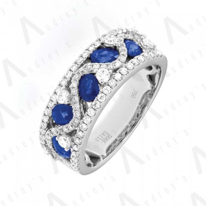 18 KARAT DIAMOND AND GEMSTONE RING