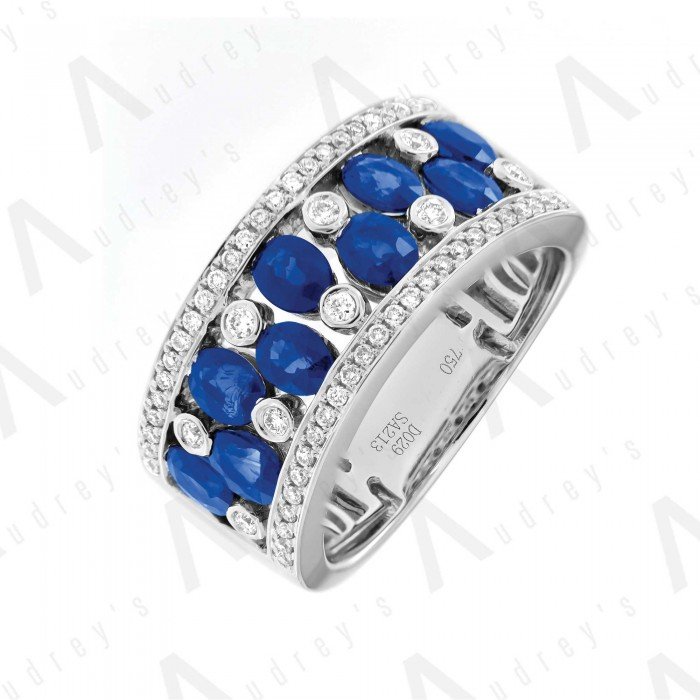 18 KARAT DIAMOND AND GEMSTONE RING