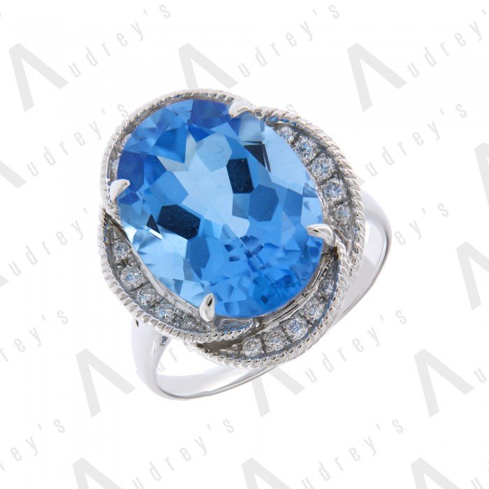 18 KARAT DIAMOND AND GEMSTONE RING