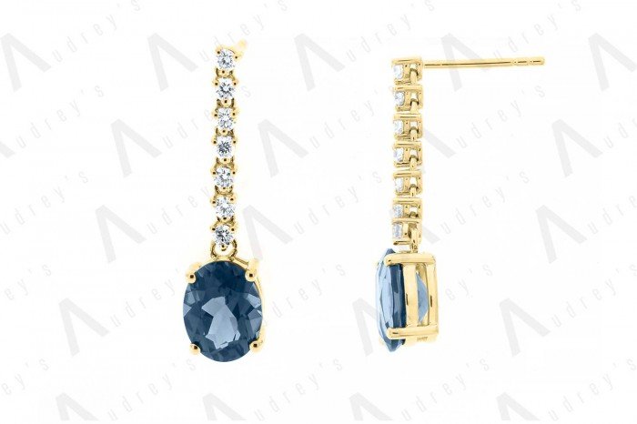 18 KARAT DIAMOND AND GEMSTONE EARRING