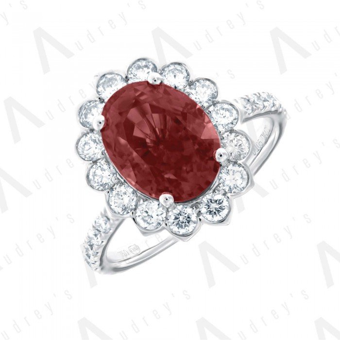 18 KARAT DIAMOND AND GEMSTONE RING