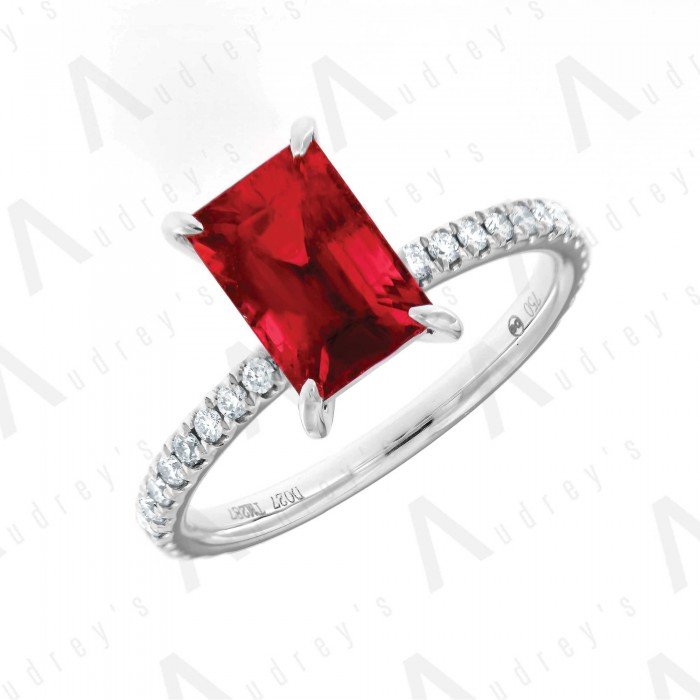 18 KARAT DIAMOND AND GEMSTONE RING