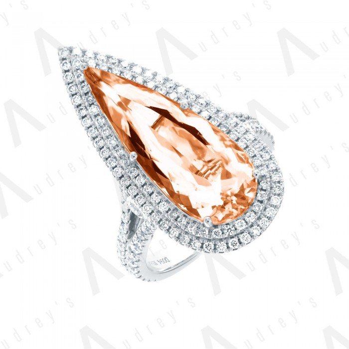 18 KARAT DIAMOND AND GEMSTONE RING