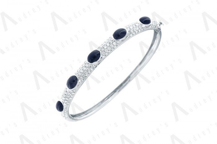 18 KARAT DIAMOND AND GEMSTONE BRACELET