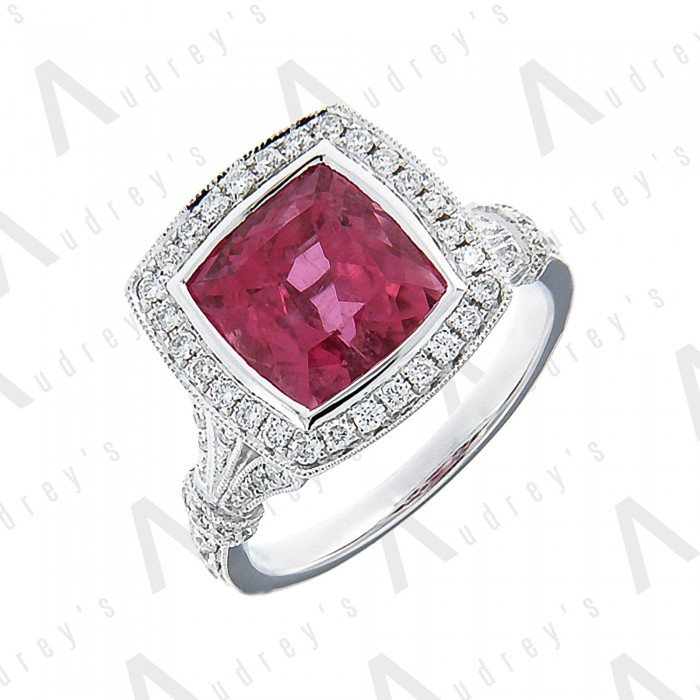 18 KARAT DIAMOND AND GEMSTONE RING