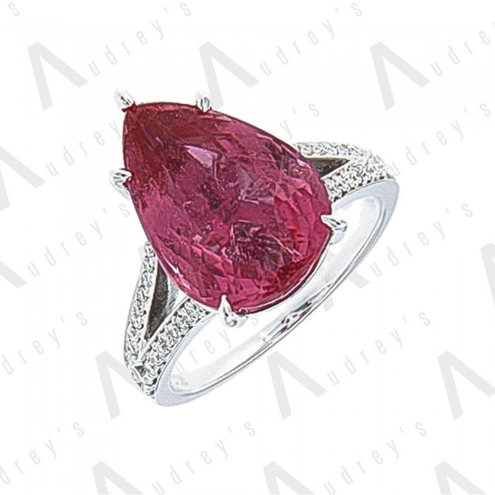 18 KARAT DIAMOND AND GEMSTONE RING
