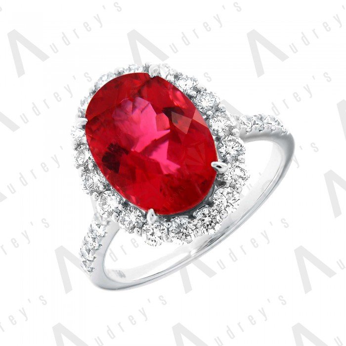 18 KARAT DIAMOND AND GEMSTONE RING