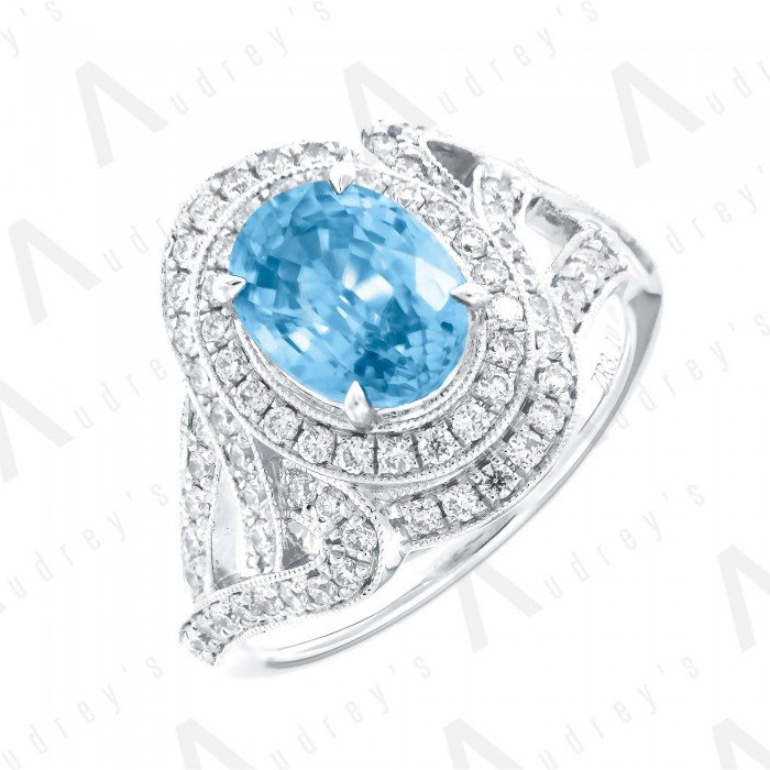 18 KARAT DIAMOND AND GEMSTONE RING