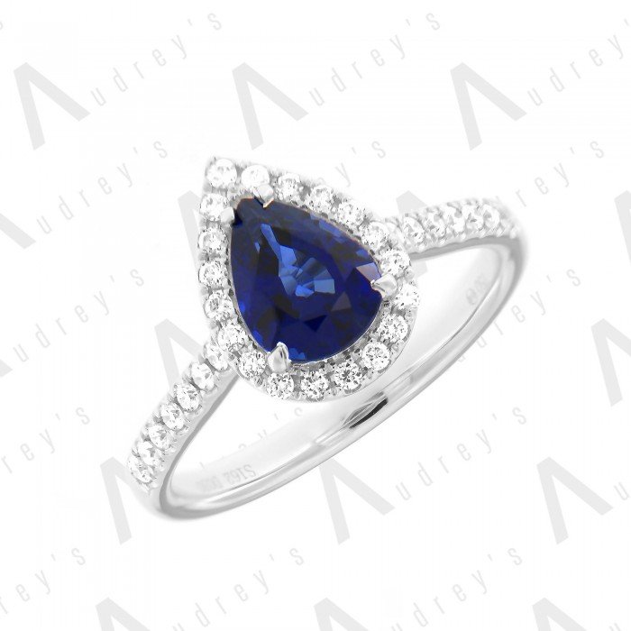 18 KARAT DIAMOND AND GEMSTONE RING