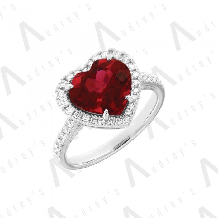 18 KARAT DIAMOND AND GEMSTONE RING