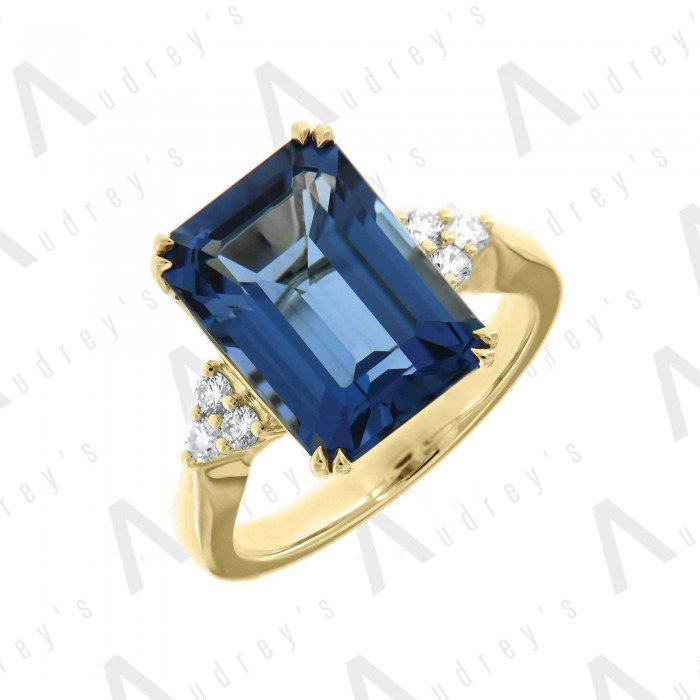18 KARAT DIAMOND AND GEMSTONE RING