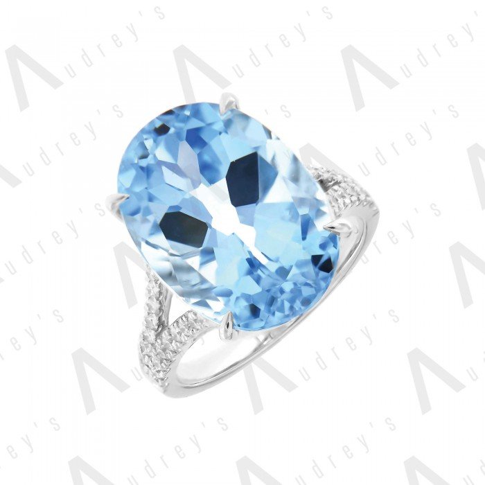 18 KARAT DIAMOND AND GEMSTONE RING