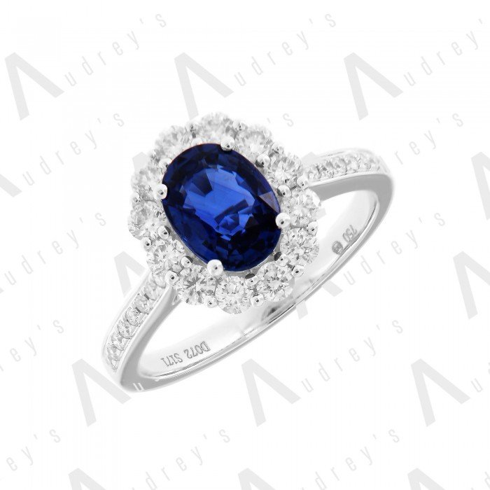 18 KARAT DIAMOND AND GEMSTONE RING