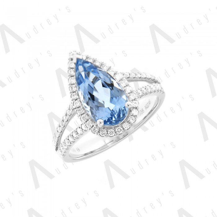 18 KARAT DIAMOND AND GEMSTONE RING