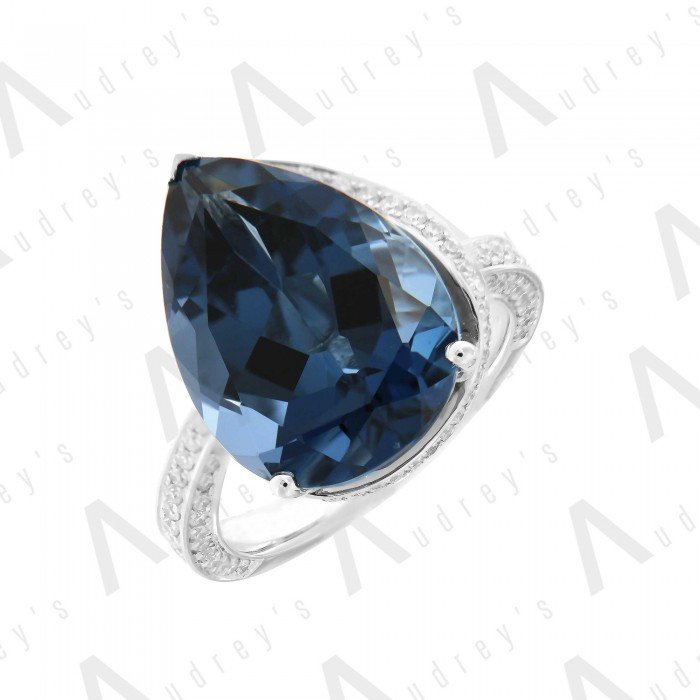 18 KARAT DIAMOND AND GEMSTONE RING